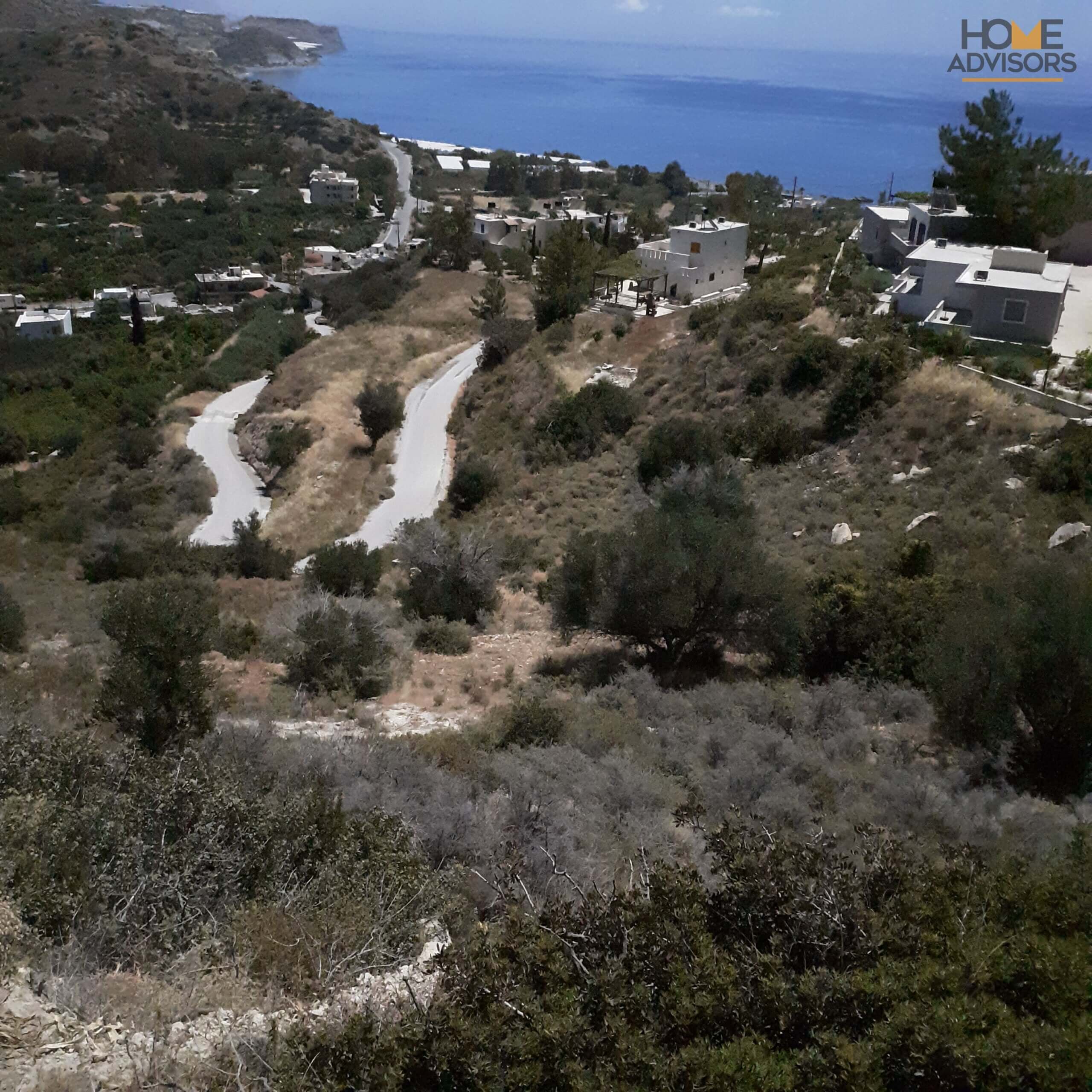 Plot in a seaside village in Crete